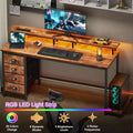 55 Inch Rustic Brown Computer Desk with Charging Station Reversible Gaming Desk LED Lights 4 Fabric Drawers Monitor Stand Home Office Writing Table