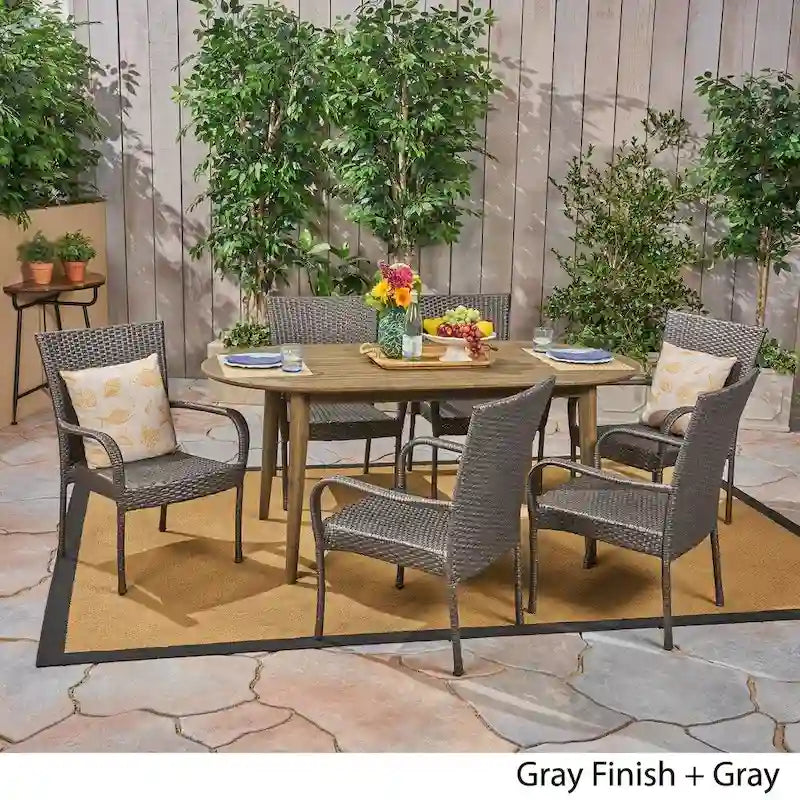 Ensemble de salle à manger d'extérieur 7 pièces en bois d'acacia Elderon avec chaises empilables en osier par Christopher Knight Home