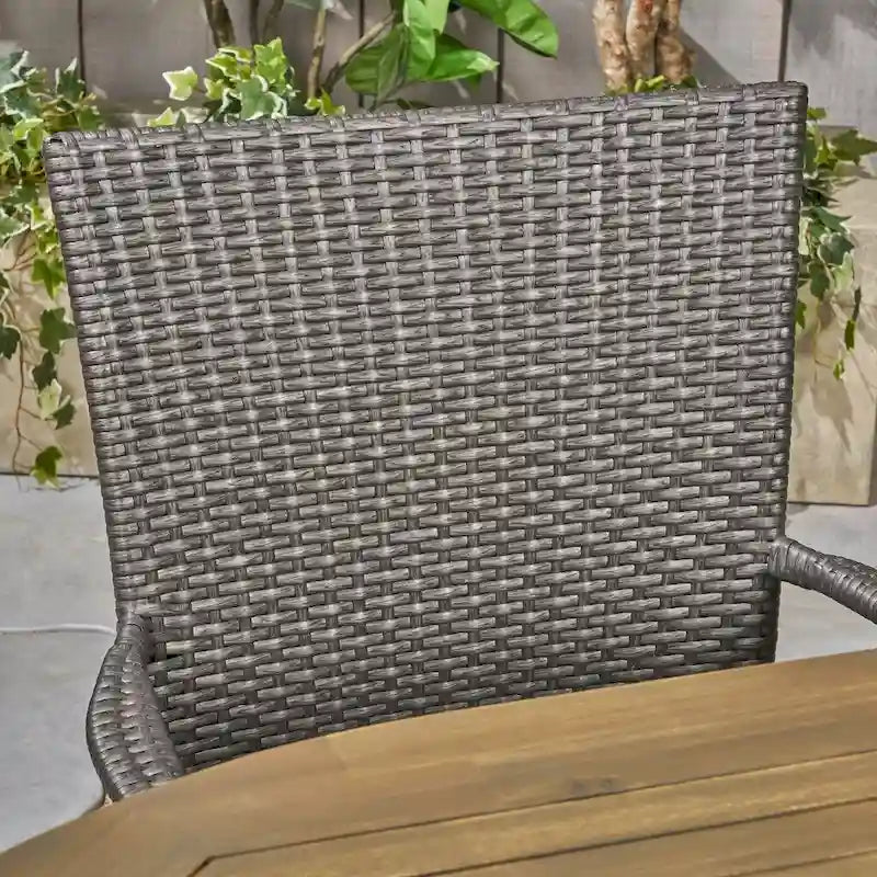Ensemble de salle à manger d'extérieur 7 pièces en bois d'acacia Elderon avec chaises empilables en osier par Christopher Knight Home