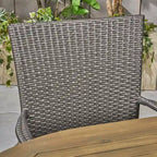 Ensemble de salle à manger d'extérieur 7 pièces en bois d'acacia Elderon avec chaises empilables en osier par Christopher Knight Home
