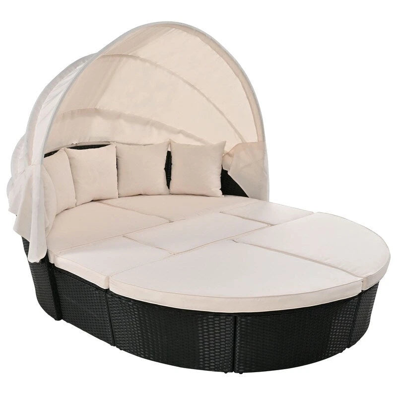 Lit de repos rond d'extérieur en rotin avec auvent rétractable et coussins lavables