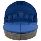 Lit de repos rond d'extérieur en rotin avec auvent rétractable et coussins lavables
